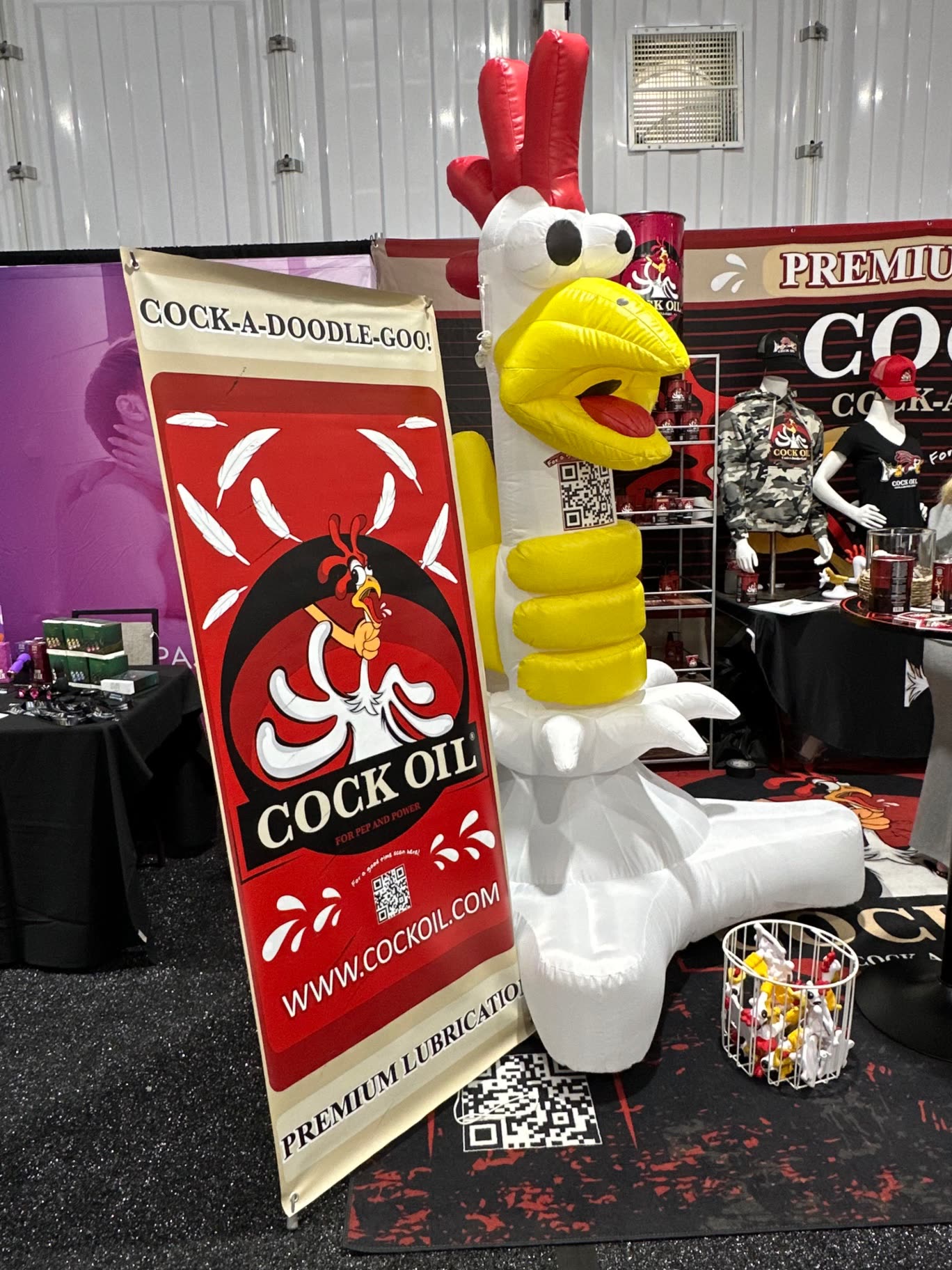 Giant Cock-A-Doodle-Goo inflatable mascot at the booth